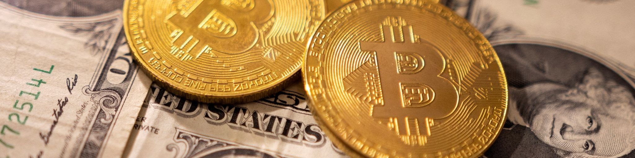 Illustration shows representations of cryptocurrency Bitcoin and U.S. Dollars